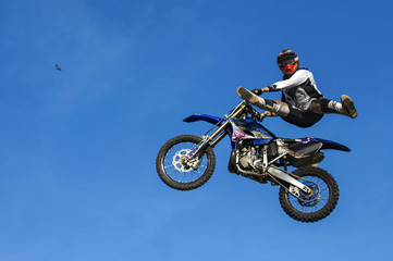 Motocross Jump on Blue Sky