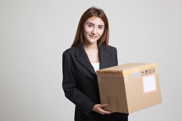 Young Asian working  woman with shipping box