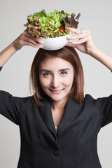 Healthy Asian woman with salad.