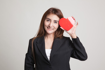 Asian woman with red heart.