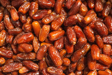 Dried dates in the box. Background.