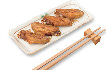Fried chicken wings and crispy garlic isolated on white background(clipping path)