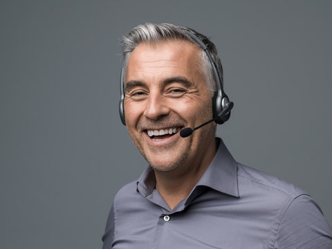 Smiling customer support phone operator