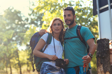 Hikers with backpacks walking at nature