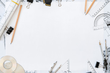 Architectural plans, pencil and ruler on the table. Place for your text