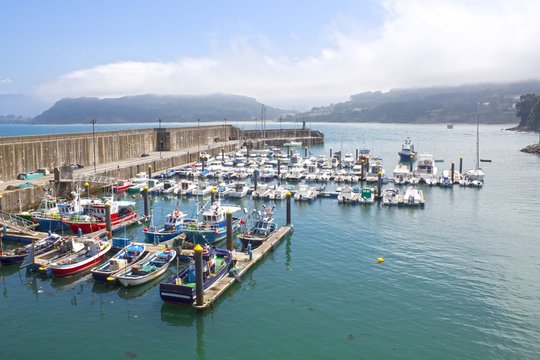 boats in a port in Lastres, Asturias, Spain