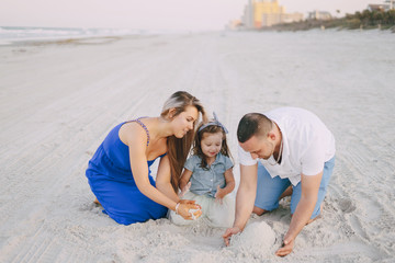 Fototapeta premium beautiful family on the beach