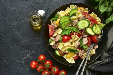 Poster Tuna salad with pasta and vegetables.Top view. © lilechka75