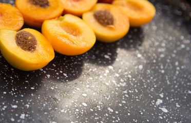 Slices of peaches on marble