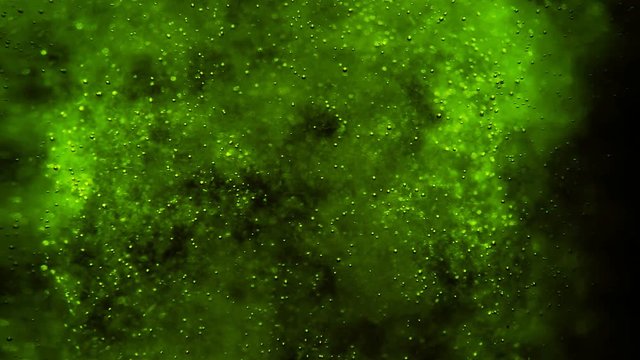 Bubbles floating in the amazing deep structured toxic green liquid. Blurred background with dimension. 