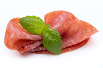 Salami slices isolated on white background.