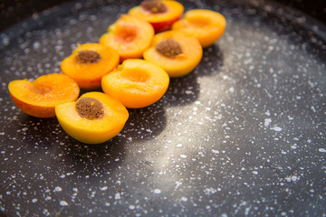 Slices of peaches on marble