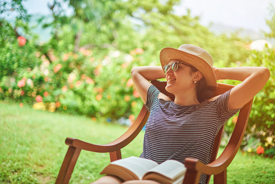 Smiling Woman In Summer Sunny Background