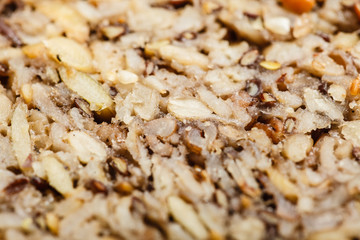 Detailed closeup whole grain bread with many grains