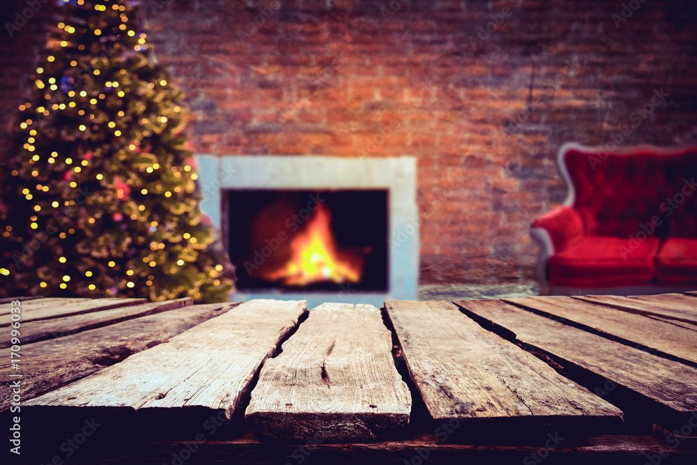 Canvas Prints christmas and new year background with empty dark wooden deck table over christmas tree and blurred 