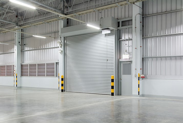 Roller door or roller shutter. Also called security door. Automatic operation with electric motor....