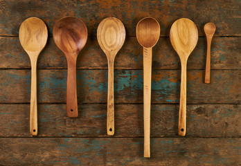 Wooden spoon on wooden board background
