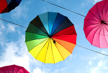 Photo of beautiful multi-colored umbrellas