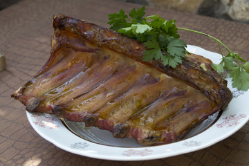 Pork ribs fried on a grill