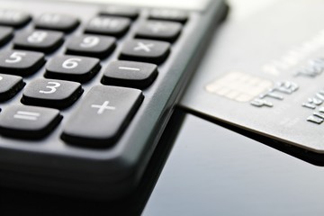 Business, finance, credit card, shopping or loan concept : Credit card and calculator on office desk table