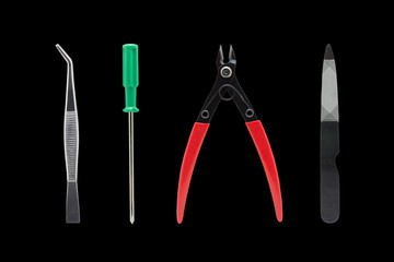 Group of Tools used in hobby jobs for craftsman. Tools isolated on black background....