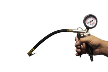 Hand holding an inflator gauge tools, Hand of mechanic man checking air pressure gauge of car tyre on white background with copy space for writing text decoration, Automotive parts concept.