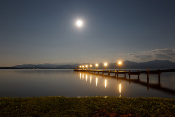 Jetty at Full Moon at Lake Chiemsee with Alps in Background, Rosenheim, Bavaria, Germany, Long Time exposure, soft
