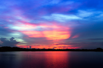 Fototapeta na wymiar Sunset and lake and twilight sky 
