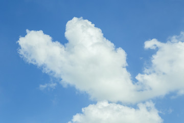 Fototapeta na wymiar Blue sky and cloud white heart.