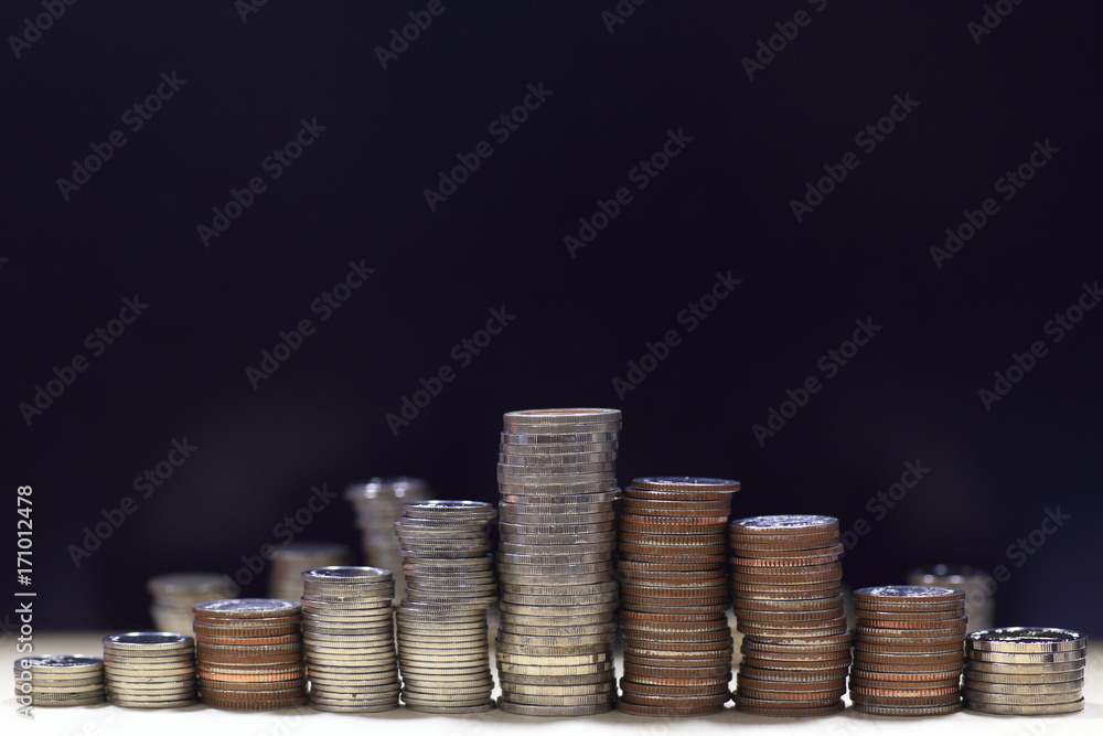 Poster isolated coin stack on black background