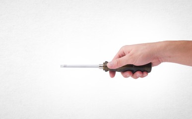 screwdriver or screwdriver in hand on a background.