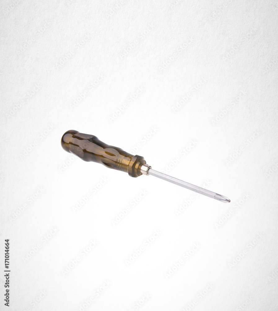 Sticker screwdriver or steel screw driver on a background.