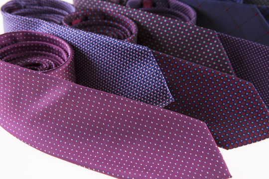 Beautiful Silk Ties Are Stacked Together.