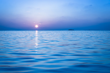 Tropical islands at sunset. Relaxing gorgeous sunset over the ocean. Watercolors in the evening.