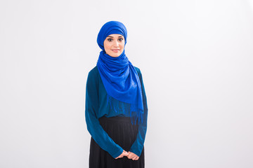 beautiful asian muslim woman model posing on white background in studio