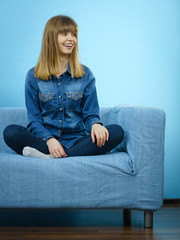 Portrait of happy blonde woman smiling with joy