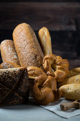 Different bread and bread slices. Food background.