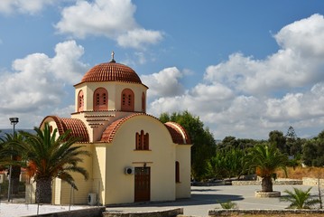 Fototapeta na wymiar Beautiful little Greek chapel at sunset on the island of Crete - Greece.