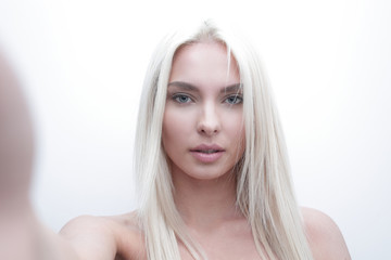 Naklejka premium close-up face of serious beautiful blond woman