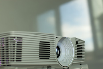 detail of an office beamer projector during a meeting