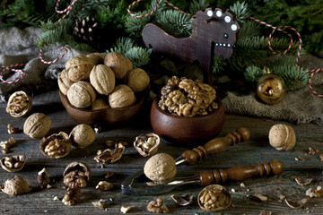 Fototapeta na wymiar Walnuts and Nutcracker. Classic Christmas and New Year background for greeting card.