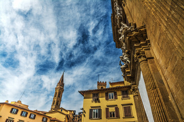 Fototapeta na wymiar Badia Fiorentina steeple and Museo del Bargello in Florence