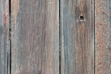 Background in style a rustic from old wooden unpainted boards with cracks