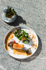 Plated freshly grilled pork belly with vegetable