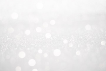 Happy New Year, Merry Christmas, celebration or holiday background concept : Shiny silver abstract background bokeh, Defocused