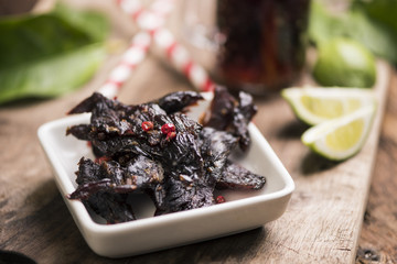 Beef Jerky on wooden background