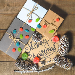 Boxes with gifts, cones, text 