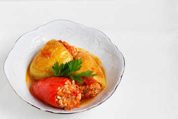 Stuffed pepper in a plate.