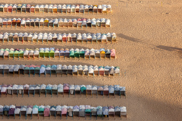lined cabins on the beach