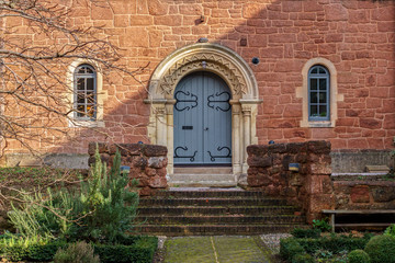 Fototapeta na wymiar old wooden residential arch door leading to the garden, Exeter, February 18, 2017